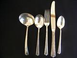 Small sample of 60 pc sterling flatware. Style- Progression.