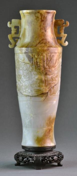 23.	A Chinese Ming or Qing Carved Celedon Jade Vase