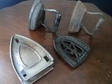 Old irons and two iron stands --- have seen hundreds of these irons but have never seen the antique stands!