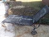 One of two wrought iron chaise lounge chairs with adjustable back!