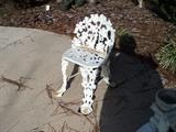 One of a pair of nice antique iron chairs!