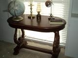 Nice oval table in the office!  Notice the lyre legs!