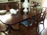 There are 8 chairs (one arm) in the dining set!  Chairs are sturdy and in excellent condition!