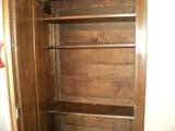 Great inside picture of the antique wardrobe!  The shelves are already there so you can fill this up for extra storage!