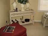 Rattan sofa table .... notice the big red stool!