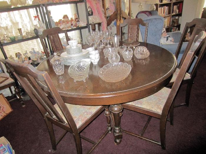Antique Karpan Bros. dining set with 6 chairs and 5 leaves