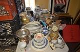 Assorted items including English china, mantle clock, silverplate wine bucket, boxed silverplate shakers, countless misc porcelain pieces (art shown back right is not included)