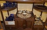 Cut cobalt glass and silverplate. Chinese shelving unit not for sale.