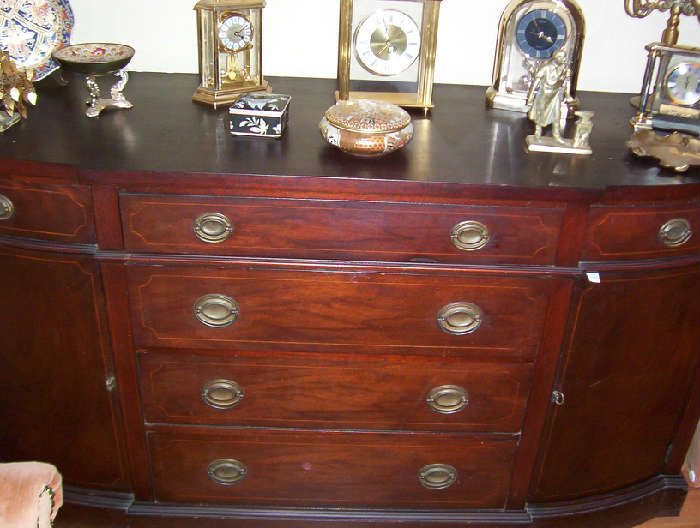 Mahogany buffet and collection of clocks