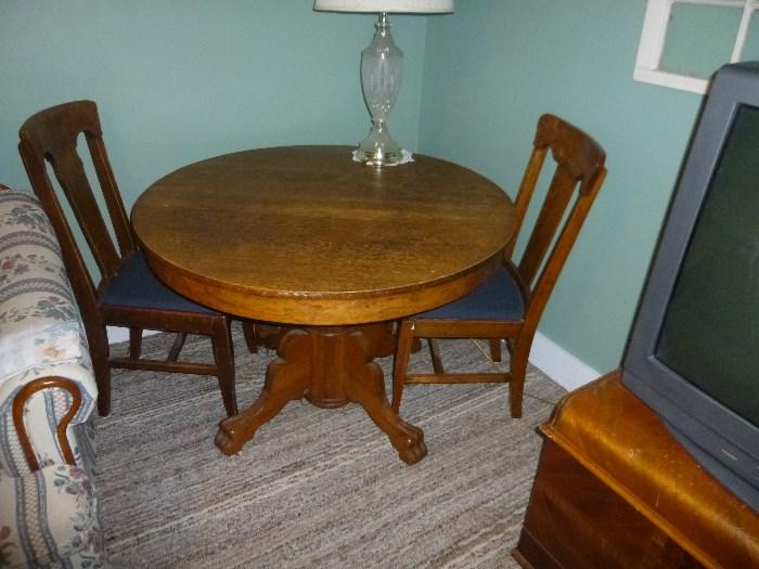Round Oak table and 2 chairs