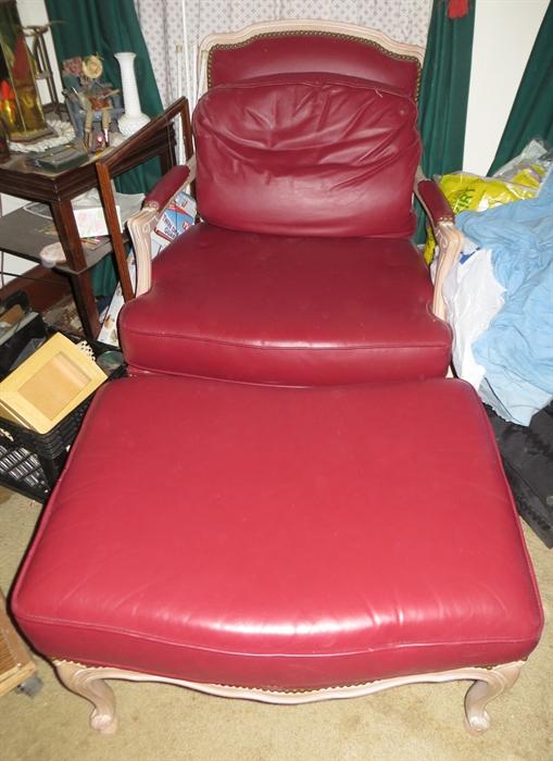 Red leather chair and ottoman