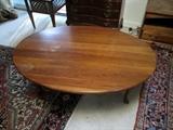 Oval drop-leaf coffee table