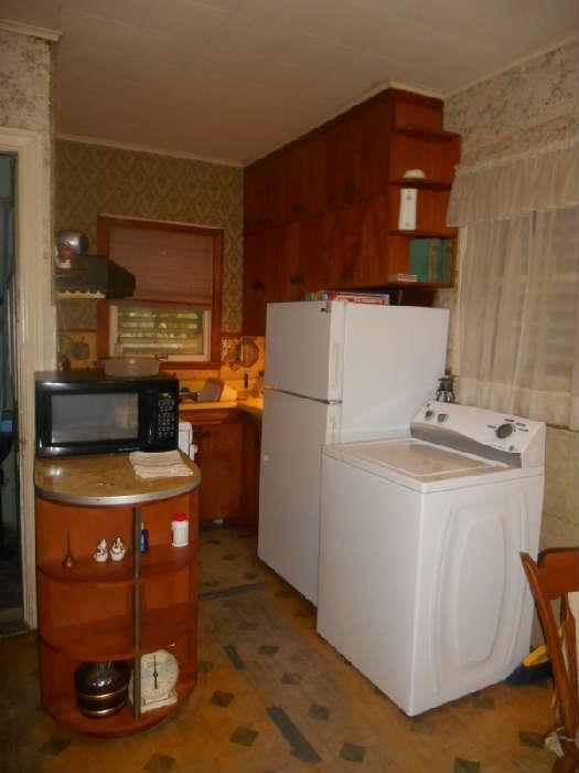 Ice Box & Sears Kenmore washing Machine...Kitchen will be closed off...Too Tiny !! Microwave stayes with the house...