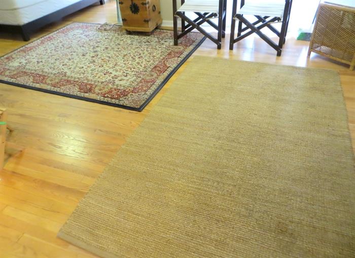Several floor rugs