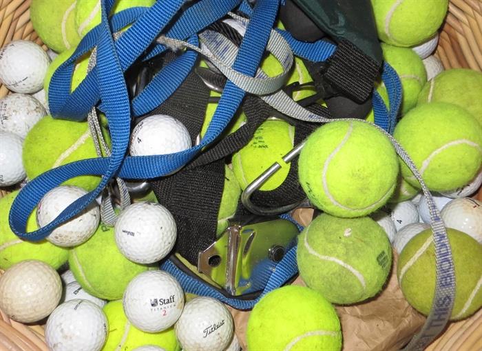 A whole barrel of tennis/golf balls