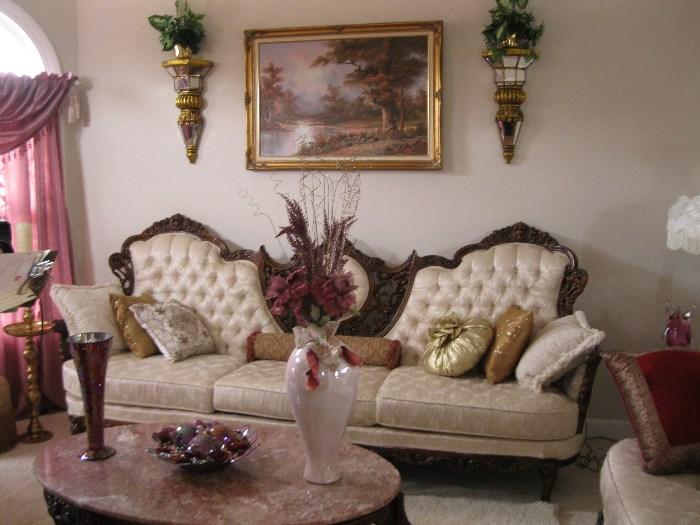 Victorian sofa and matching loveseat, marble top coffee table and end tables, art work