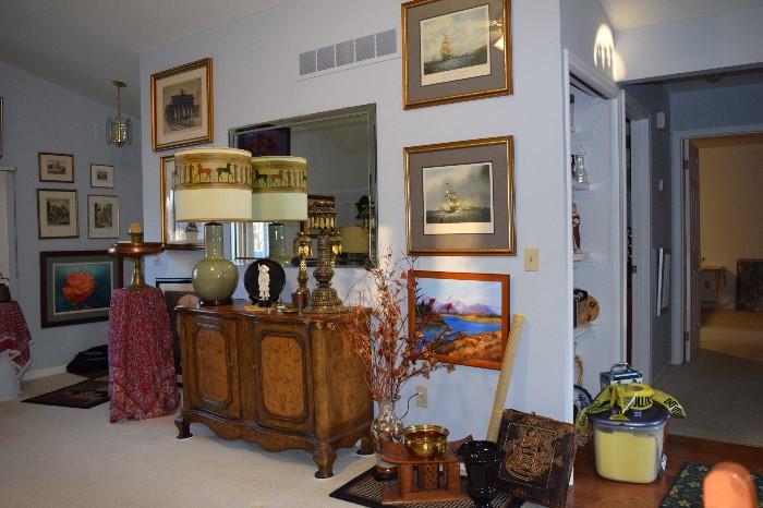 Credenza, Oriental or Contemporary Lamp with Unique shade, Etchings, Oil Paintings, Chief's Seat/Neck Rest Bench, Leather Cushion, Haeger Vase, Plate with Inlaid Silver, Brass Candle holders