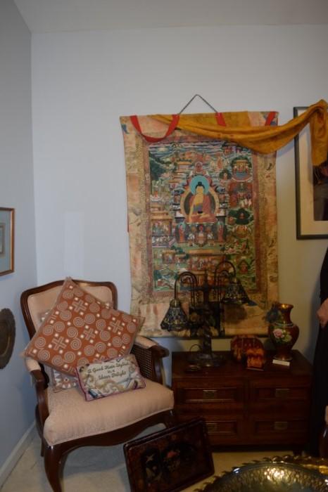 Ceremonial Tapestry called a Thangka, there is information on the cloth that will be posed with it at the estate sale.
