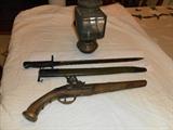 Flint lock pistol, WWI bayonette with1917 flaming bomb insignia