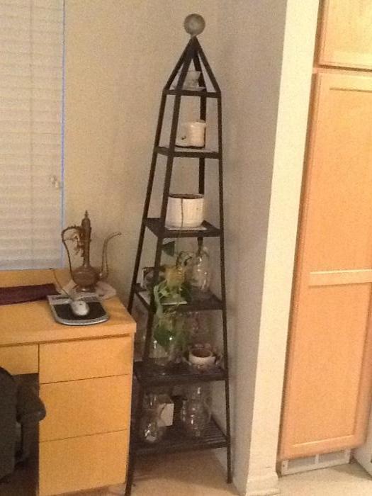 Black metal and glass tiered (6 shelves) stand