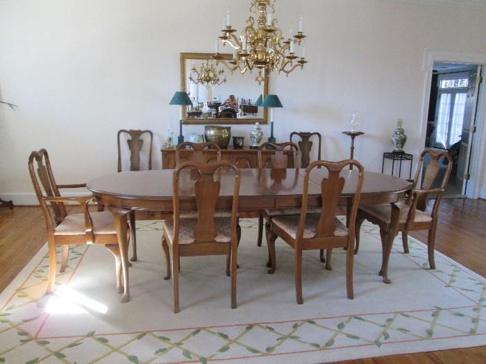 Davis Cabinet Co. of Nashville, Tenn. dining table with 3 leaves, 8 chair & table pads