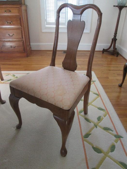 One of the dining chairs to Davis Cabinet Co. dining table