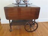 Vintage rolling serving cart with bamboo motif