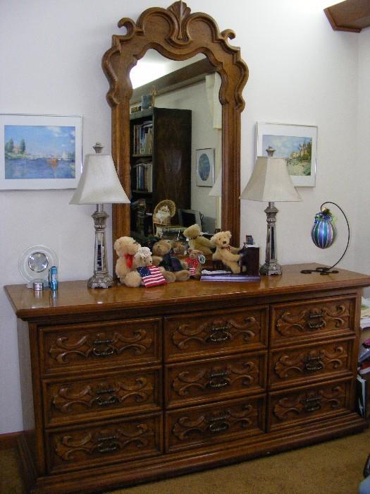 Beautiful matching Drexel pecan triple dresser with 9 drawers and in excellent condition. $495.00