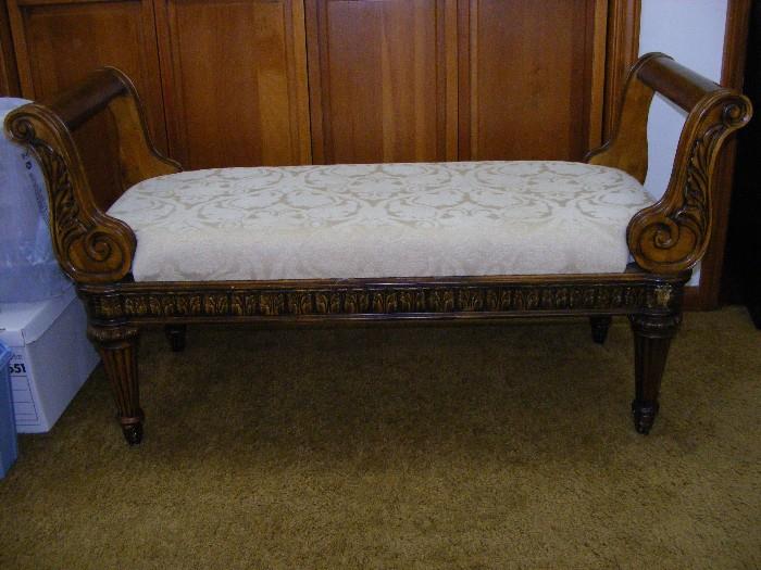 Lovely upholstered bench with turned legs and extended carved scroll handles.  Goes beautifully with bedroom set.  In perfect condition.  $295