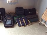 luggage and assorted travel bags, backpacks