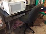Metal desk with office chair