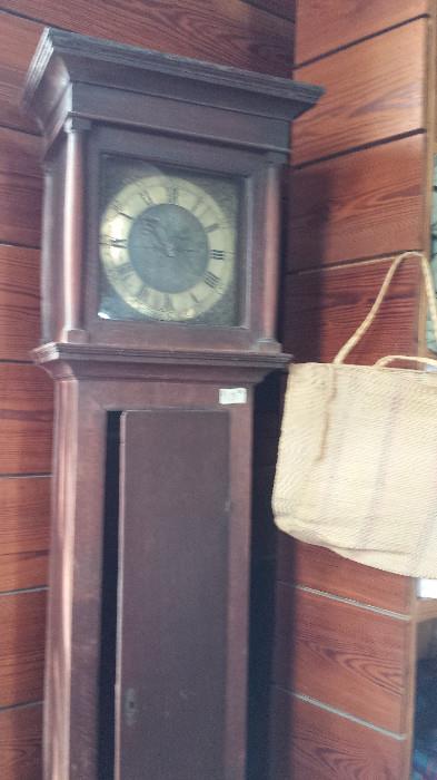 Antique tall case clock in a simple design. Needs TLC.