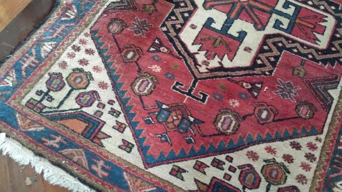 One of six wonderful vintage and antique Persian rugs. All are small scatter size.