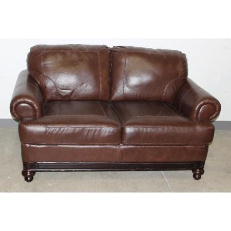Nice brown leather loveseat in overall good condition