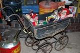 Old doll buggy with antique dolls