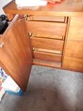 Door opens to 3 drawers