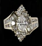 Lot 524:
Ladies Diamond and 14K Yellow Gold Ring