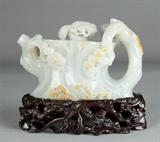 Lot 601:
Exceptional Qing Carved White Jade Tea Pot