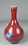 Lot 649:
Chinese Qing Raspberry Flambe Glazed Vase