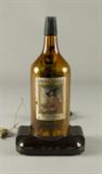 Lot 698:
Magic-Tone Whiskey Bottle Radio Model 504