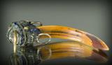 Lot 752:
Chinese Gilt Metal Mount Tiger Tooth
