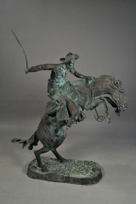 Frederick Remington near life size bronze titled " The Bronco Buster"