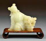 65. CHINESE QING CARVED SOAPSTONE FIGURAL CARVING.