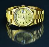 13. Rolex Presidential 18Kt Gold Watch