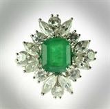 7. A Lady’s Emerald, Diamond & 18K Gold Ring