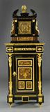 36. A Gilt Bronze & Ebony Wood Cabinet & Matching Clock