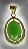 6. A Fine 14K & Imperial Jade Pendant