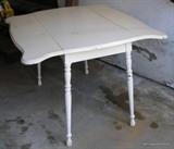 Primitive drop side table