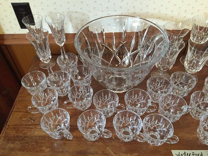 Lismore Waterford Crystal Collection containing Punch Bowl with 20 cups, 10 each 8-1/2" Dessert or Salad Plates, Three Champagne Glasses, Four Each Red & White Wine Glasses