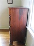Side view of hard wood cabinet / dresser.